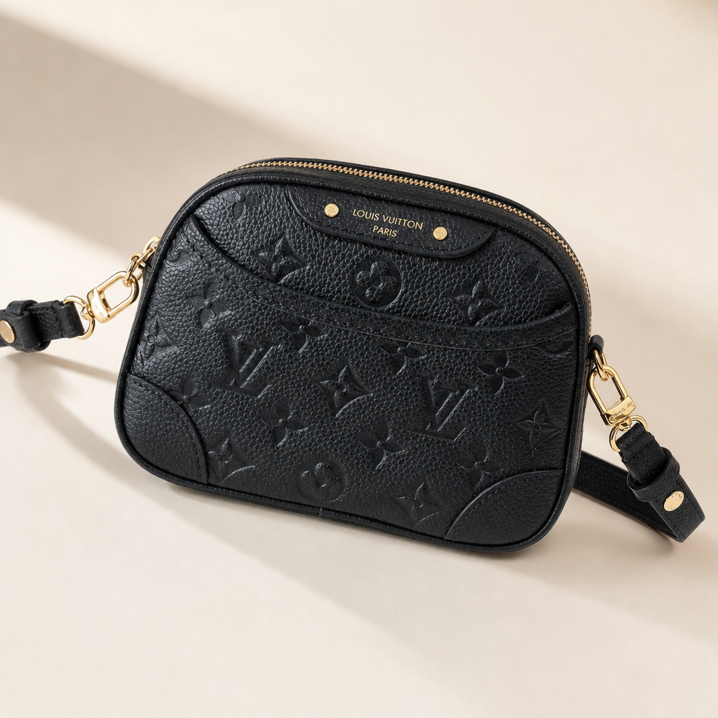 Embossed Monogram Top-Handle Crossbody — hero