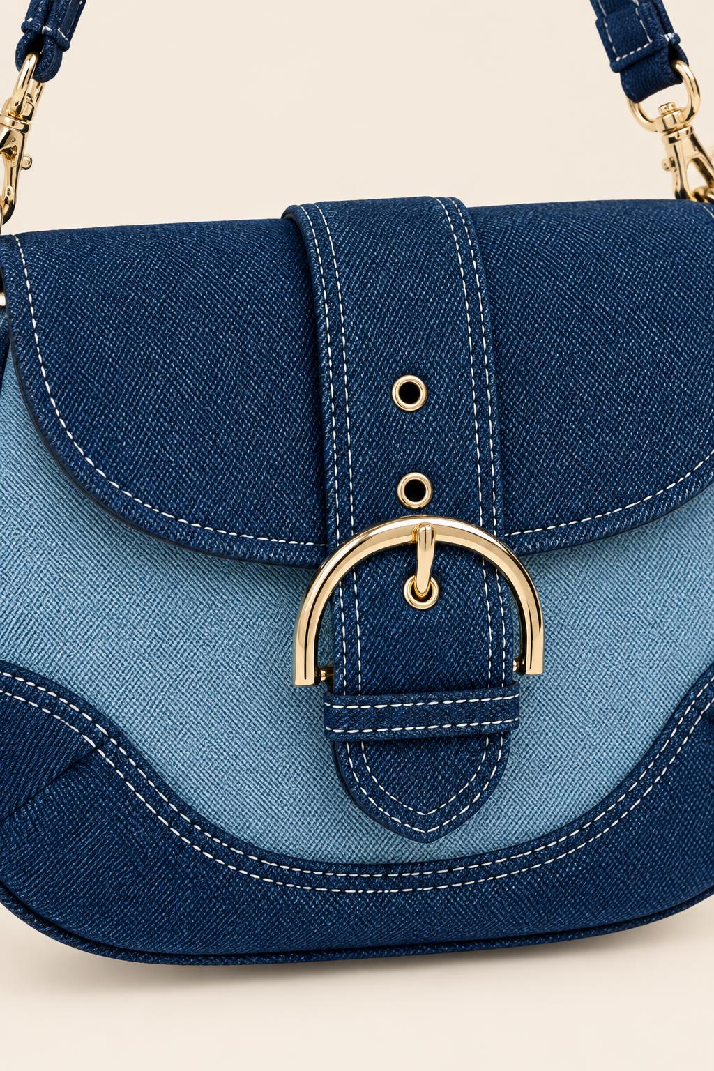 Denim Saddle Shoulder & Crossbody Bag — carrying view