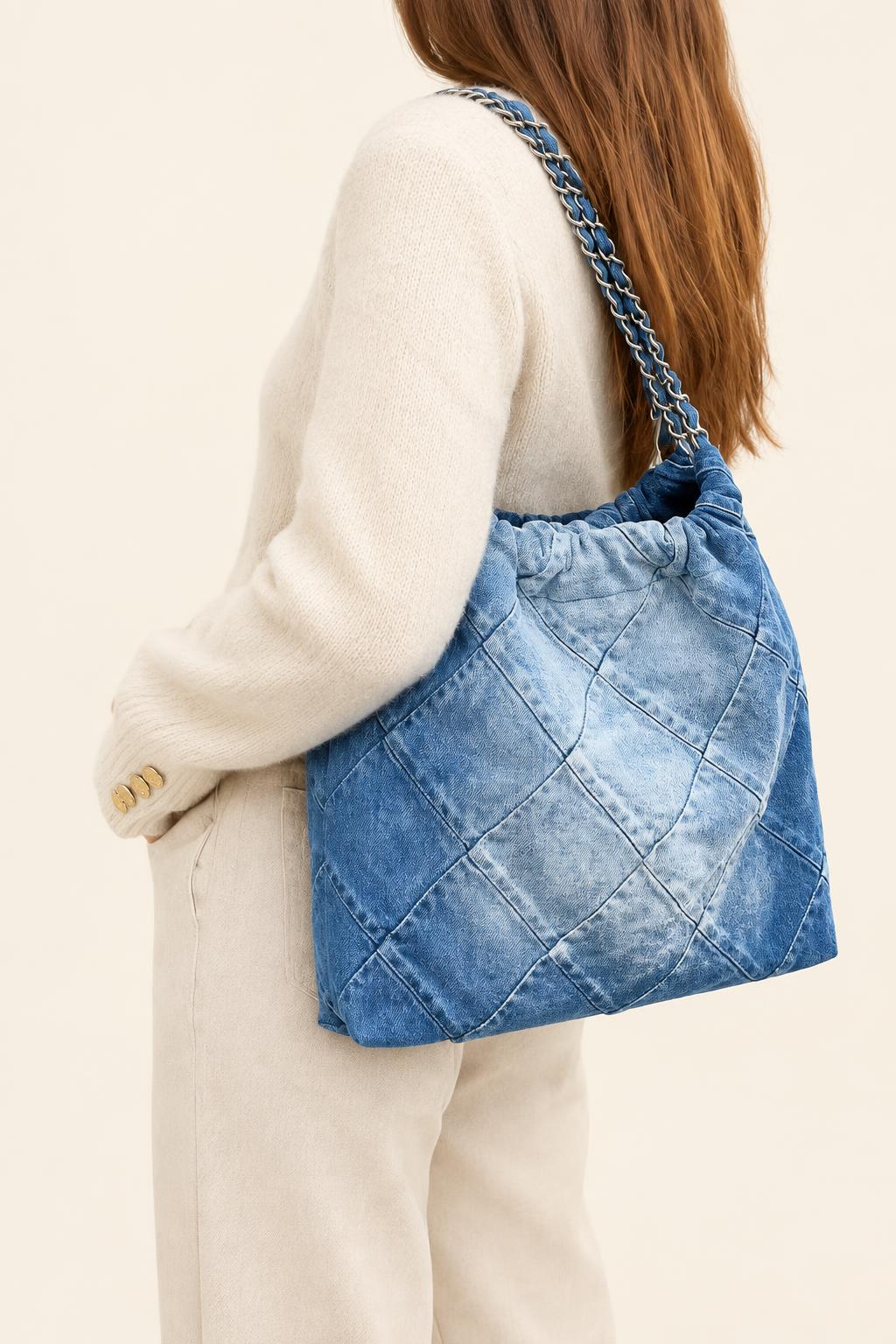 Washed Denim Quilted Chain Shoulder Bag — carrying view