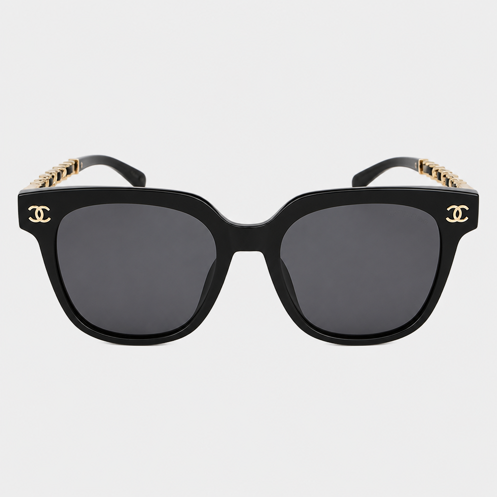Rounded Square Chain-Detail Eyewear — Black frame with dark gray tinted lenses and black-and-cream patterned temples; complete front view