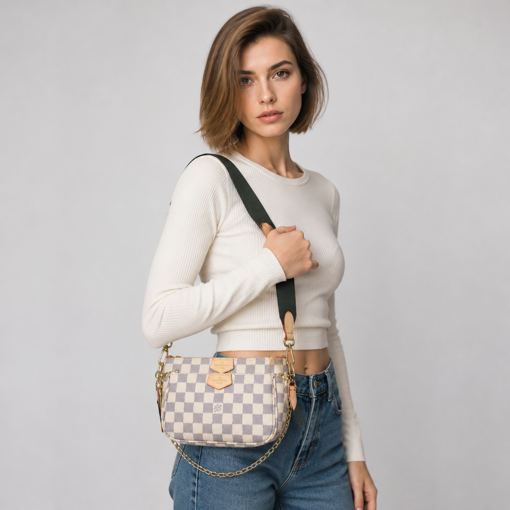 Cream/light gray checker, green-black strap — studio model photo.