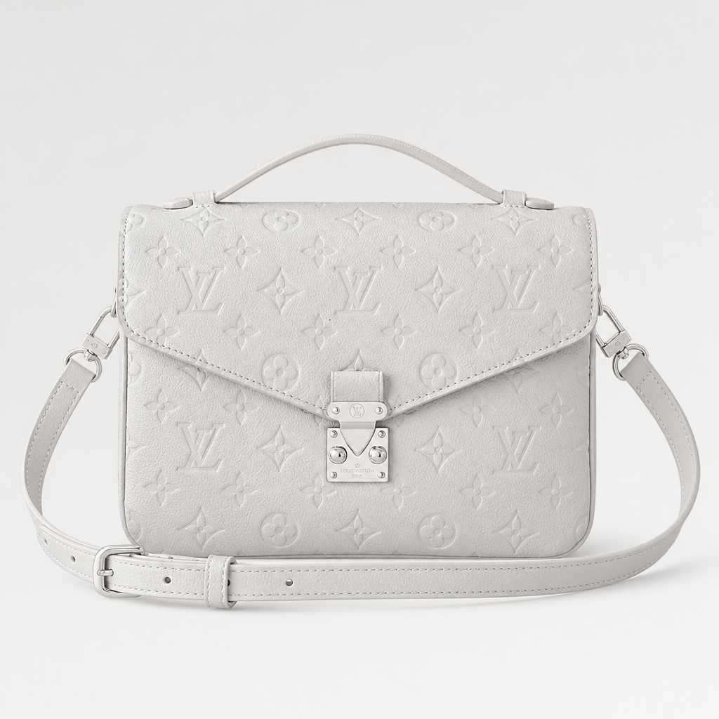 White embossed, silver hardware, turn-lock, 3.5 in depth — front view.